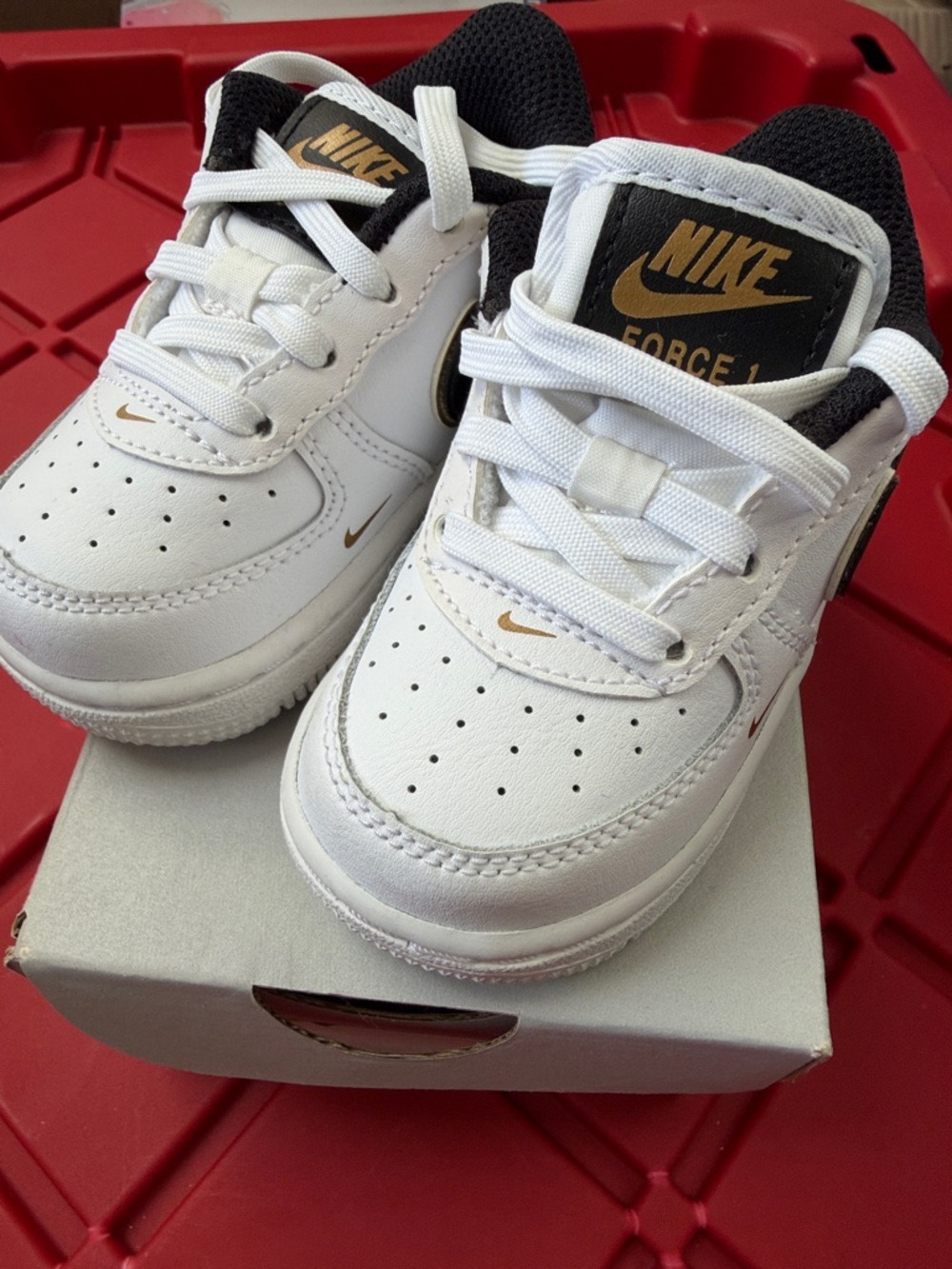 Nike Air Force 1 LV8 Kids White and Black Sneakers with Gold Swoosh